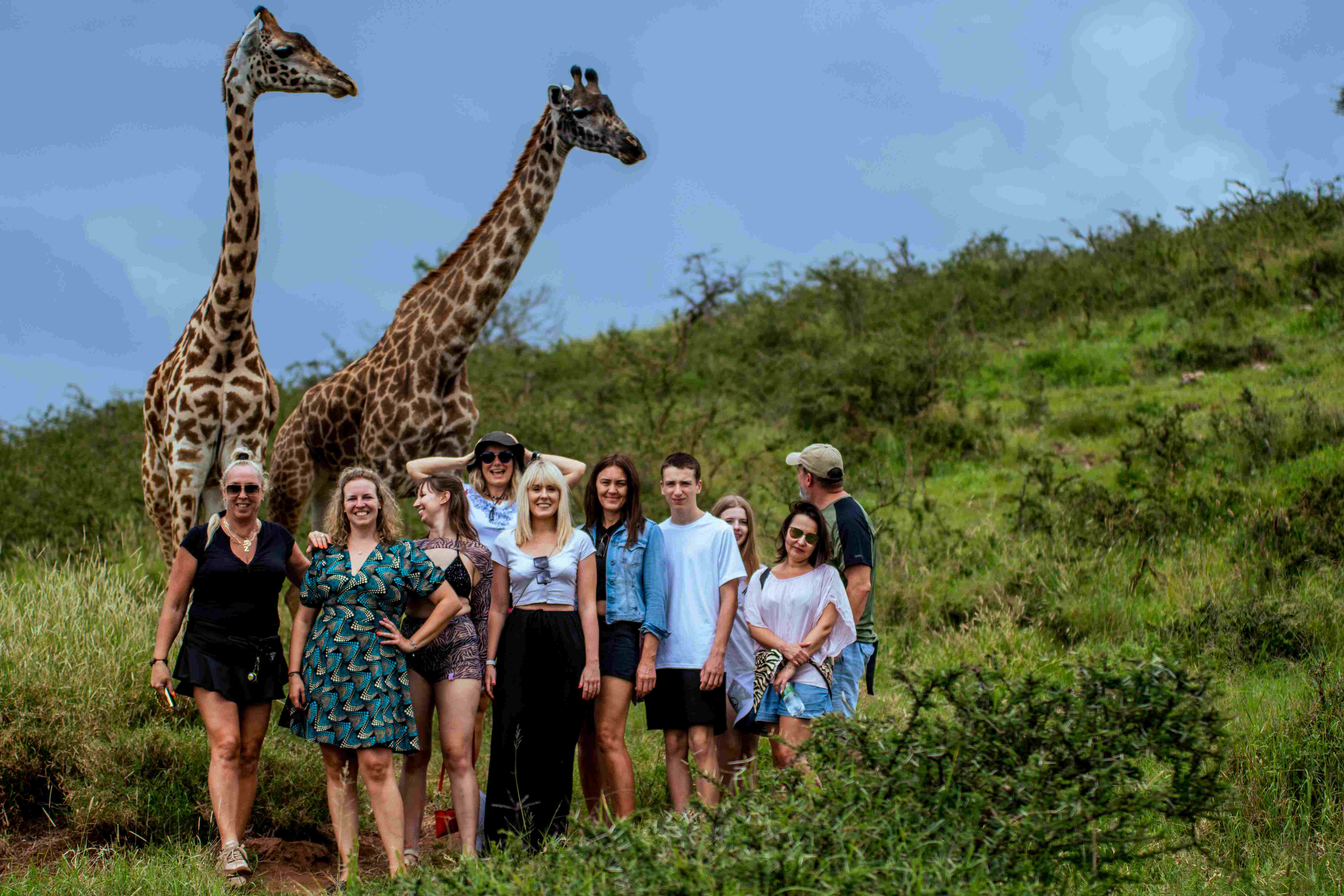 Group of travelers enjoying a safari game drive