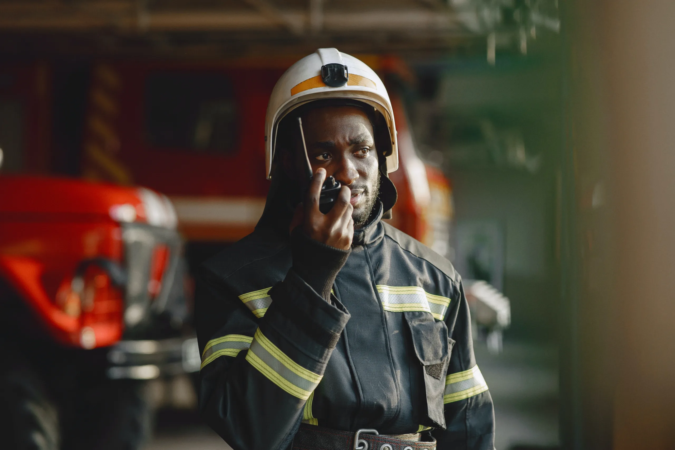 Person using a satellite phone or guide using radio